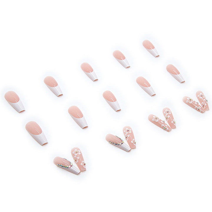 Artificial nail set with romantic floral decorations and glitter accents Kalsten