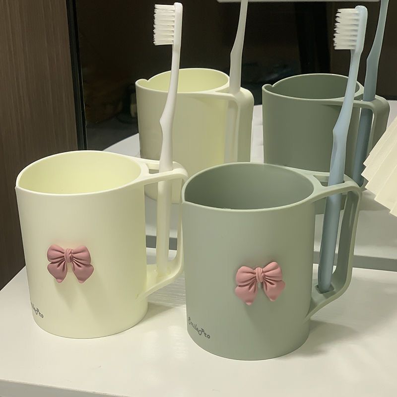 Ceramic mug with elegant bow motif Kalsten