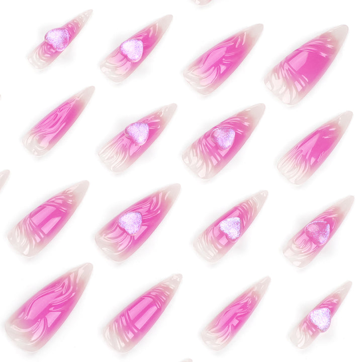 Artistic stiletto nails with heart design and glitter accents Kalsten