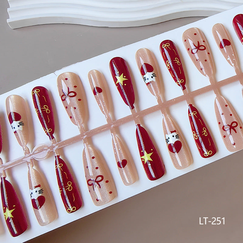 Artificial nails in festive Christmas design Kalsten