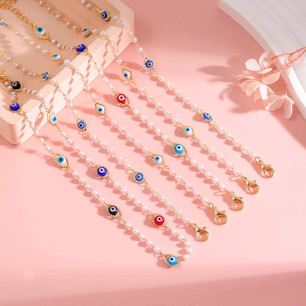 Elegant Pearl and Eye Charm Necklace Kalsten