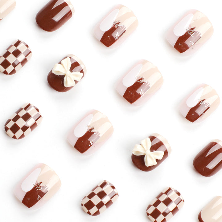 Creative Nail Art with Modern Patterns and Bow Motifs Kalsten