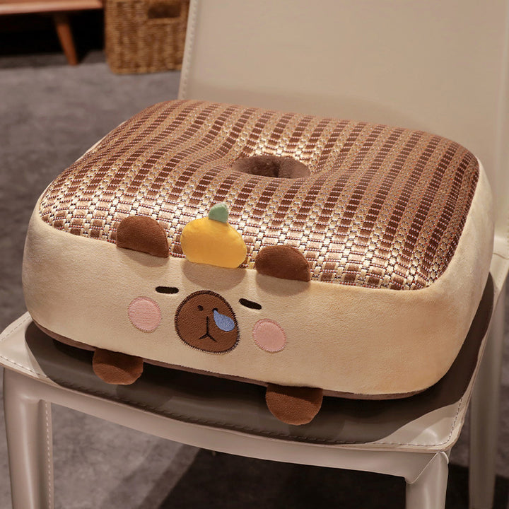 Plush pet bed with raised edge and removable cuddly pillow
