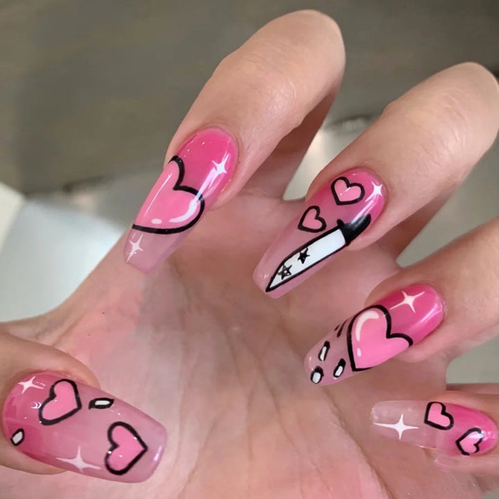 Artful stiletto nails with romantic heart design Kalsten