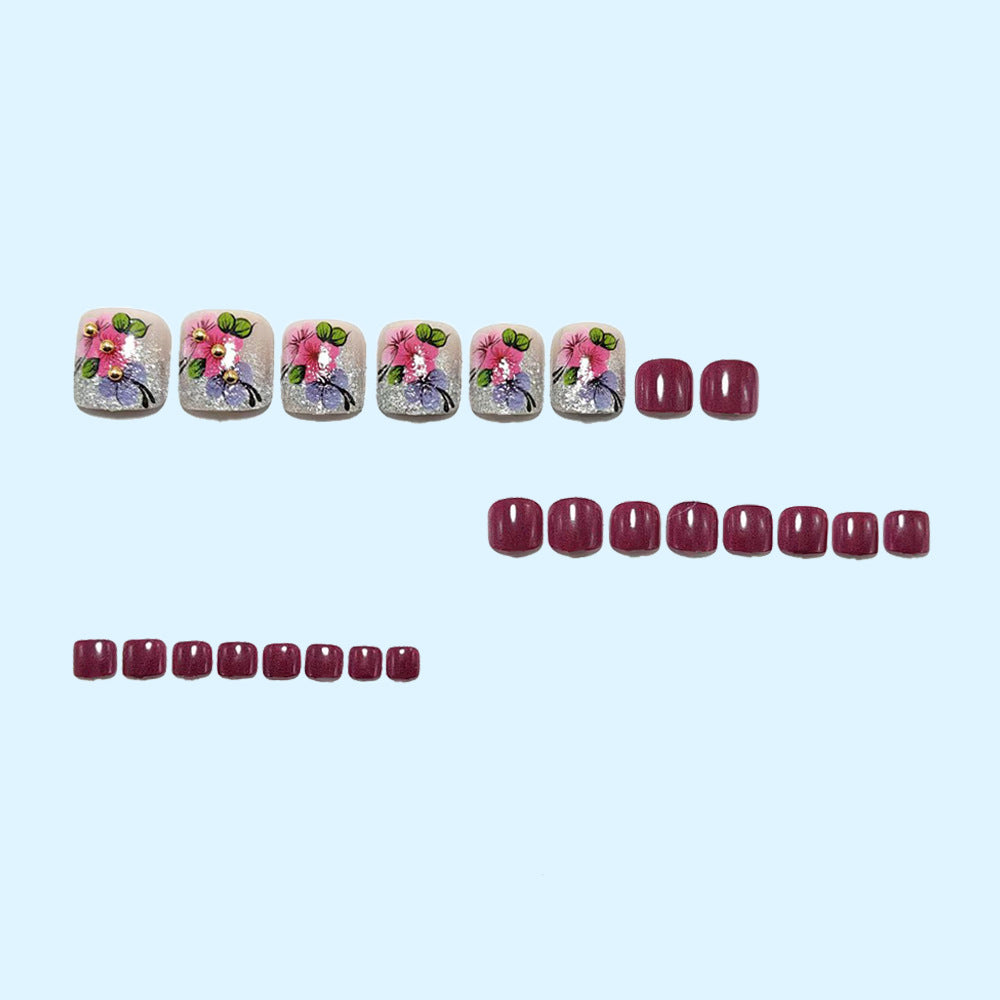 Artificial nails with floral motifs and glitter accents Kalsten