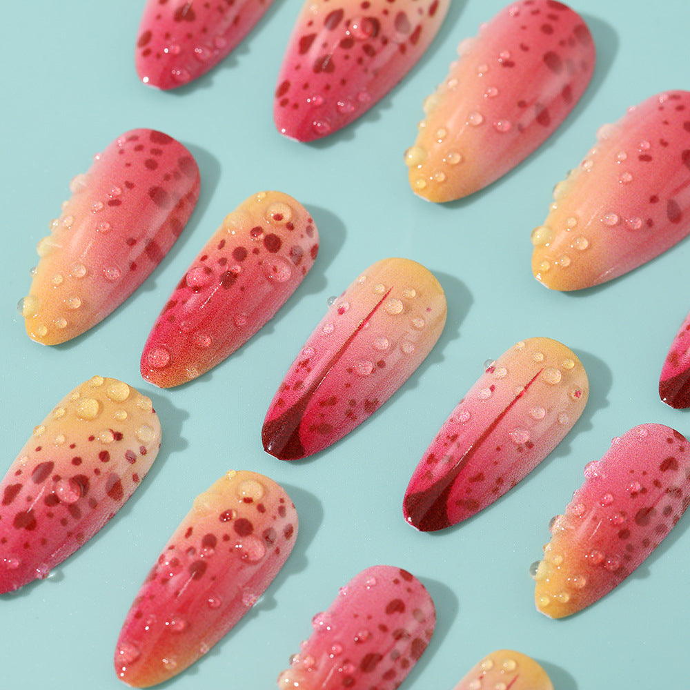 Creative artificial nails with appealing ombre and glitter effects Kalsten