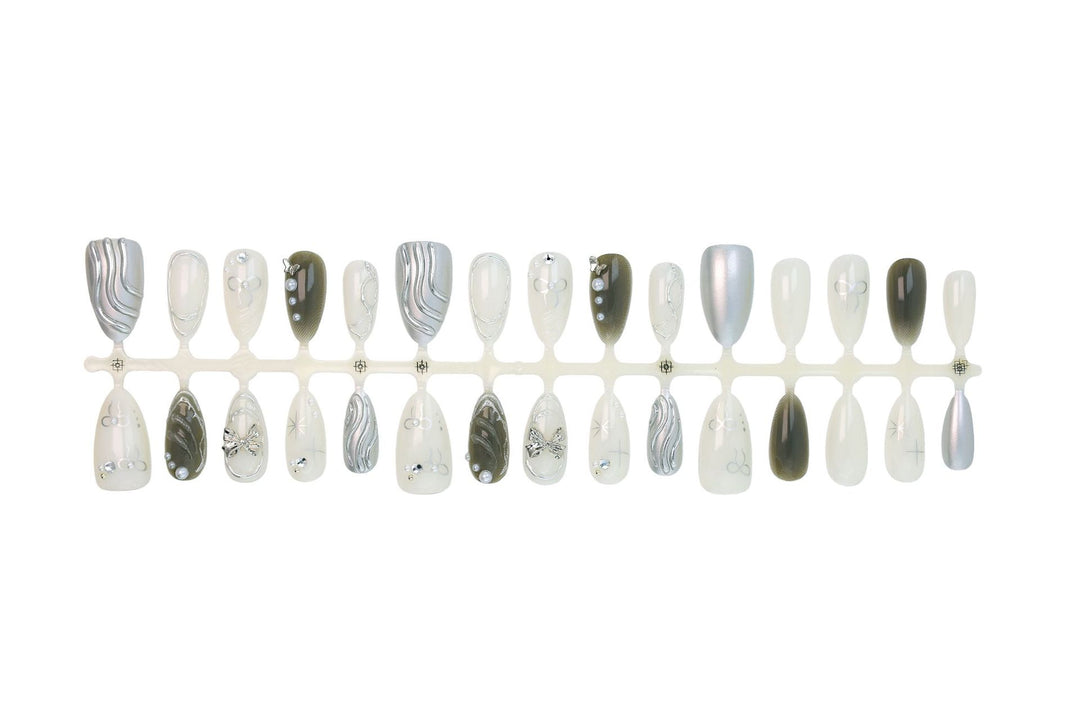Nail set with luxurious 3D decorations and elegant stone accents Kalsten