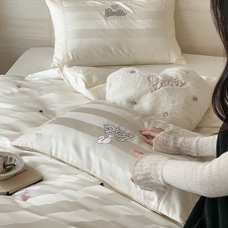 Luxurious cotton percale bedding set with fine striped jacquard look and embroidered lettering