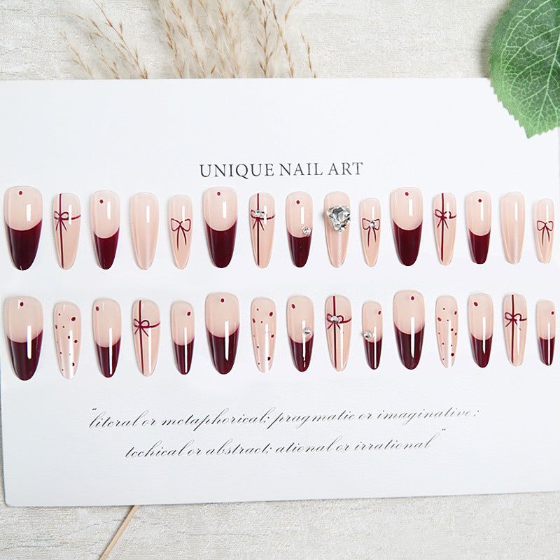 Artificial nail set with elegant bow and glitter details Kalsten