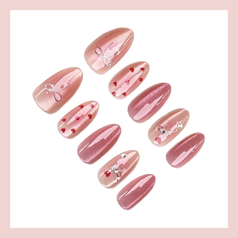 Nail art set with romantic hearts and elegant bows Kalsten