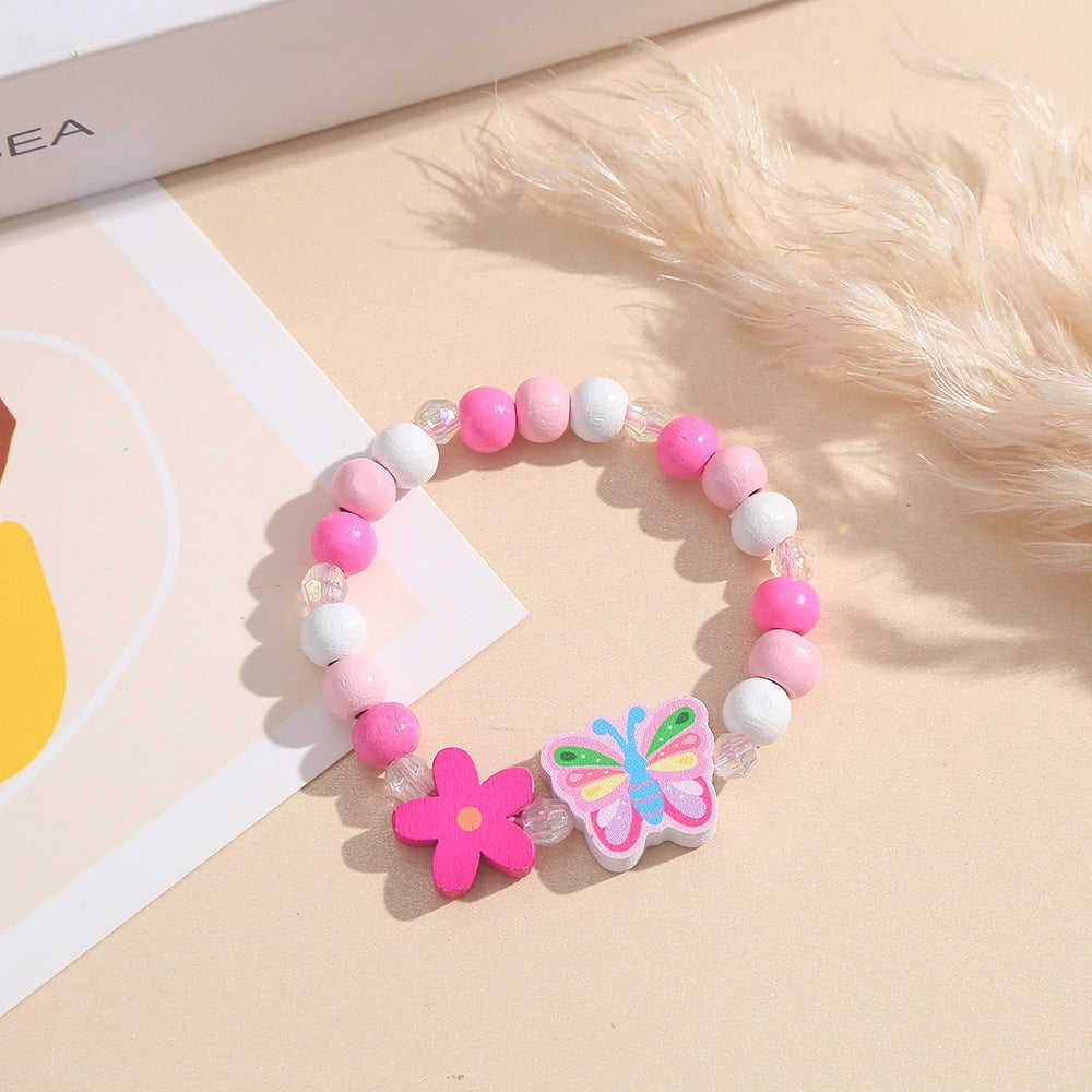 Playful bracelet with heart and butterfly charms Kalsten