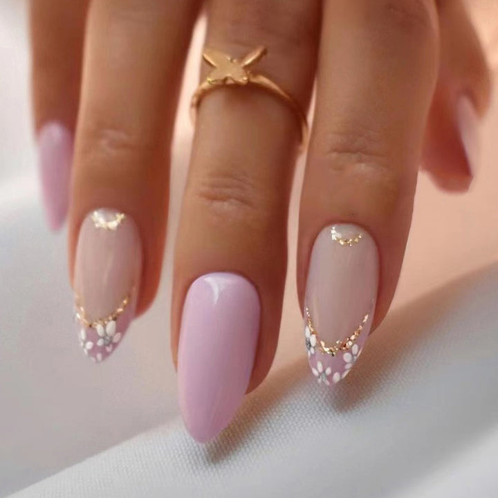 Elegant artificial nails with floral design and golden accents Kalsten