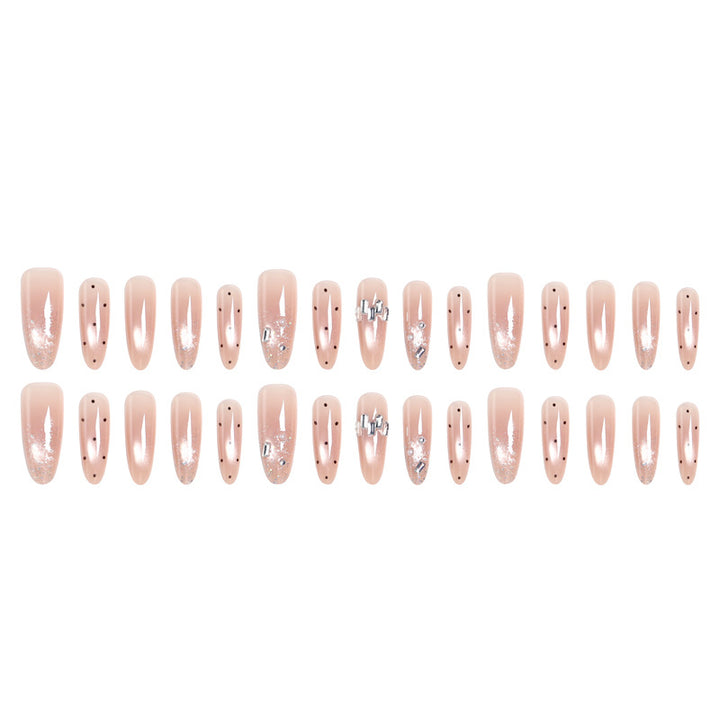Artificial nail set with sparkling glitter and elegant jewelry details Kalsten