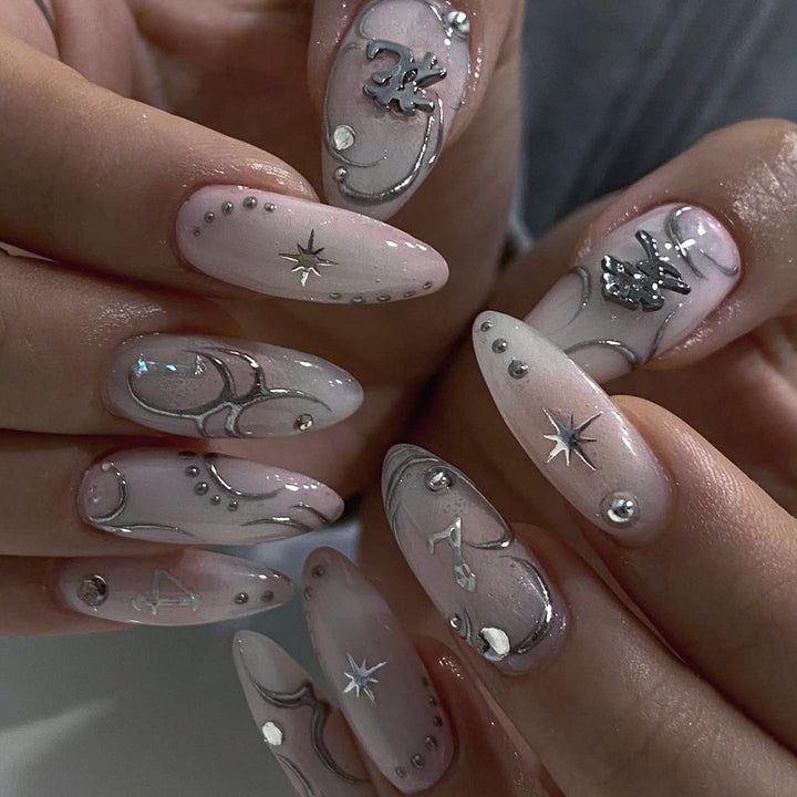 Artistic acrylic nails with elegant glitter patterns Kalsten