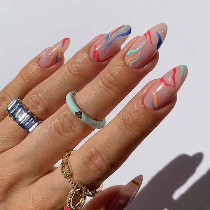 Artful nail extensions with an elegant leaf pattern Kalsten