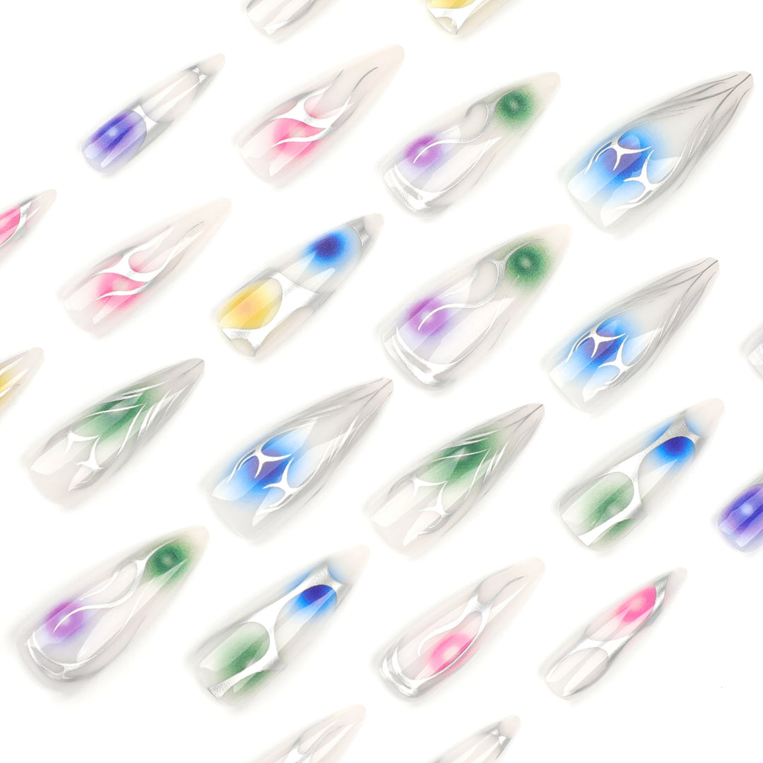 Artful stiletto nails with transparent design and colorful accents Kalsten