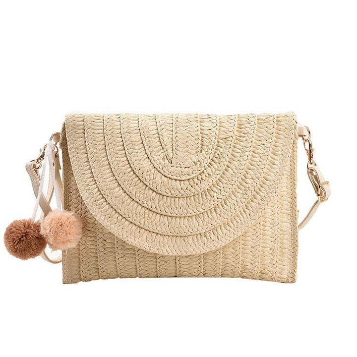 Braided shoulder bag with creative pom poms Kalsten