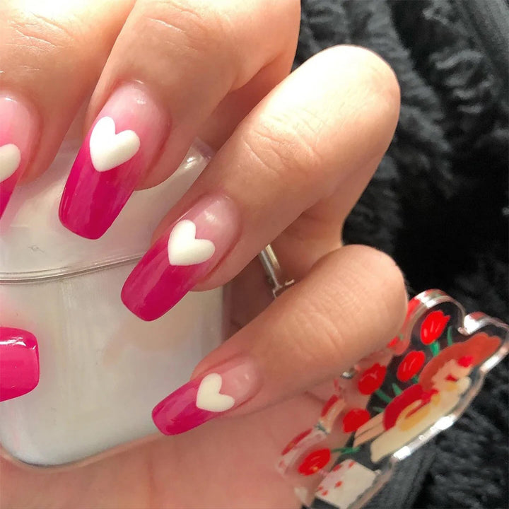 Artful nail extensions in romantic heart design Kalsten