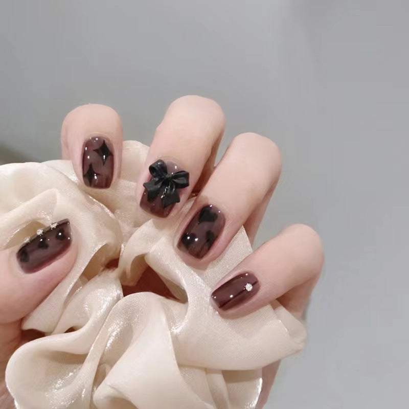Artificial nails with elegant ribbon and heart designs Kalsten