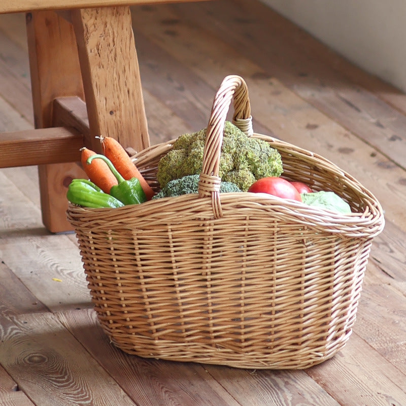 Storage basket made of natural rattan Kalsten
