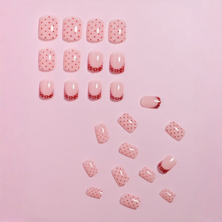 Stylish Press-On Nail Design with Polka Dot and French Tip Accents Kalsten