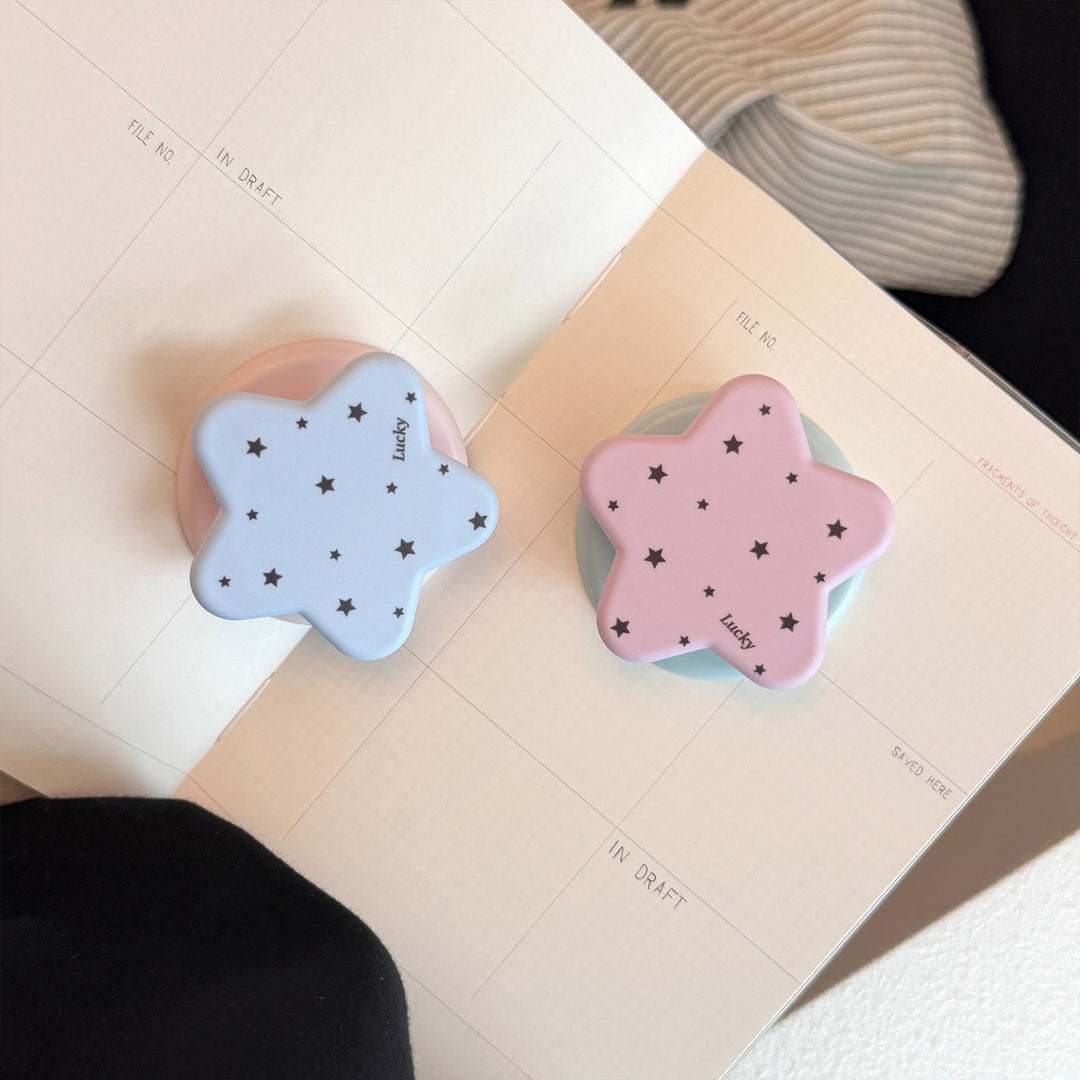 Playful smartphone holder in star design Kalsten
