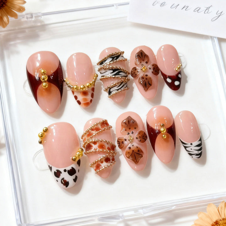 Artistic Press-On Nail Set with Floral and Gemstone Accents