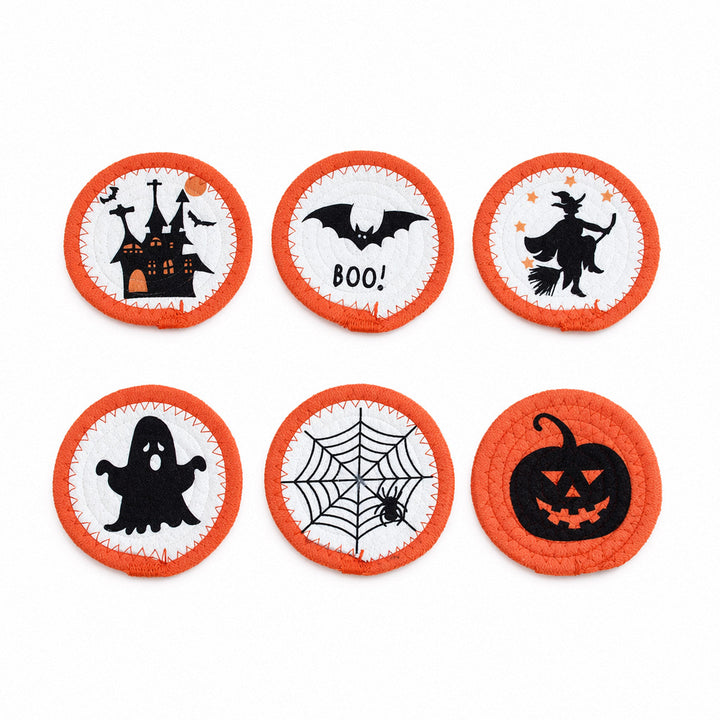 Round felt and cotton coasters with embroidered Halloween haunted house motif