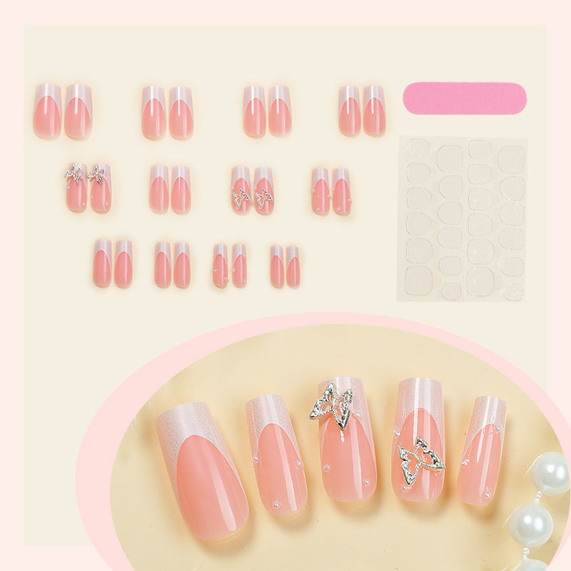 Nail art set with intricate designs and butterfly appliqués Kalsten