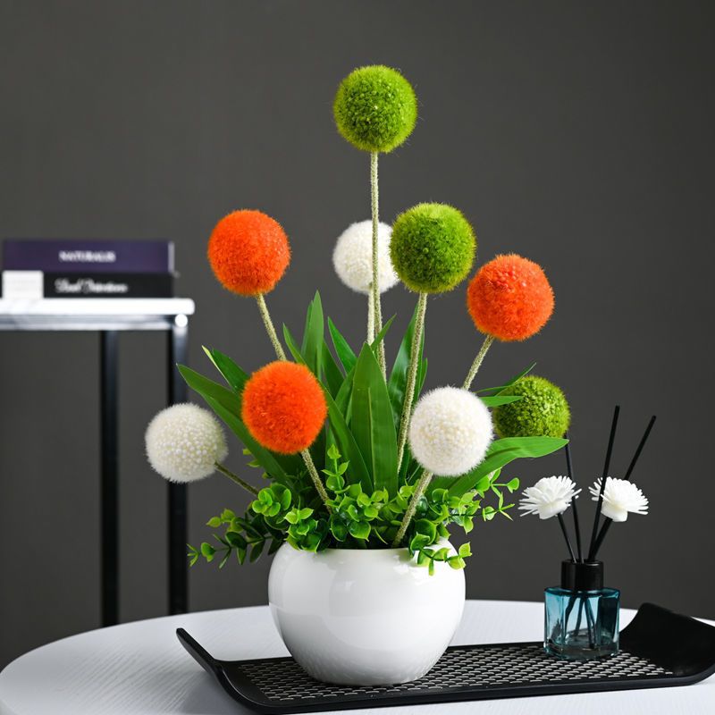 Artificial Floral Arrangement in Modern Ceramic Vase