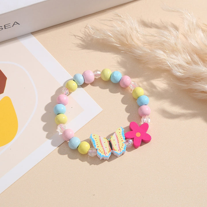 Playful bracelet with heart and butterfly charms Kalsten