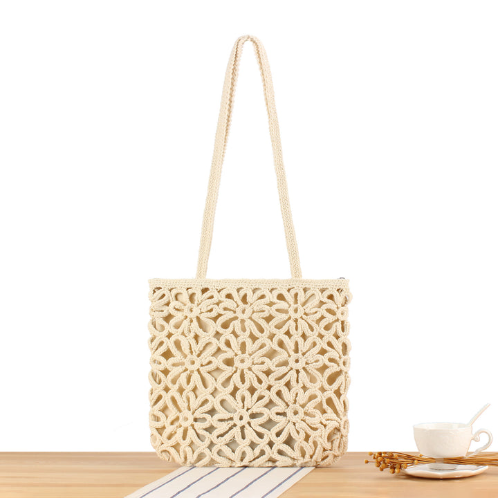 Handbag made of artistic macramé with floral details Kalsten