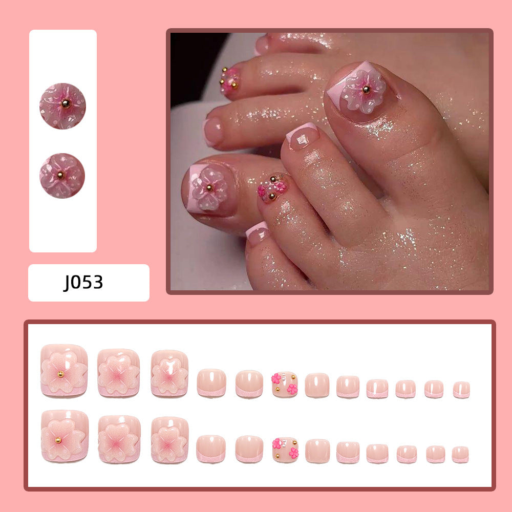 Artful toenail decorations with blooming accents Kalsten