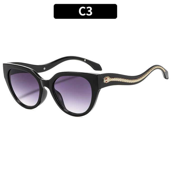 Chic Cat-Eye Sunglasses with Snake Accents