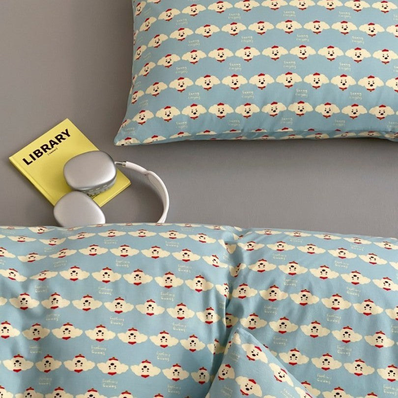 Light cotton bedding set with quilted topper and fine stripe pattern