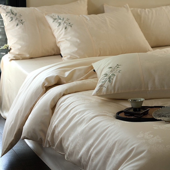 Luxurious satin bedding set with delicate floral embroidery