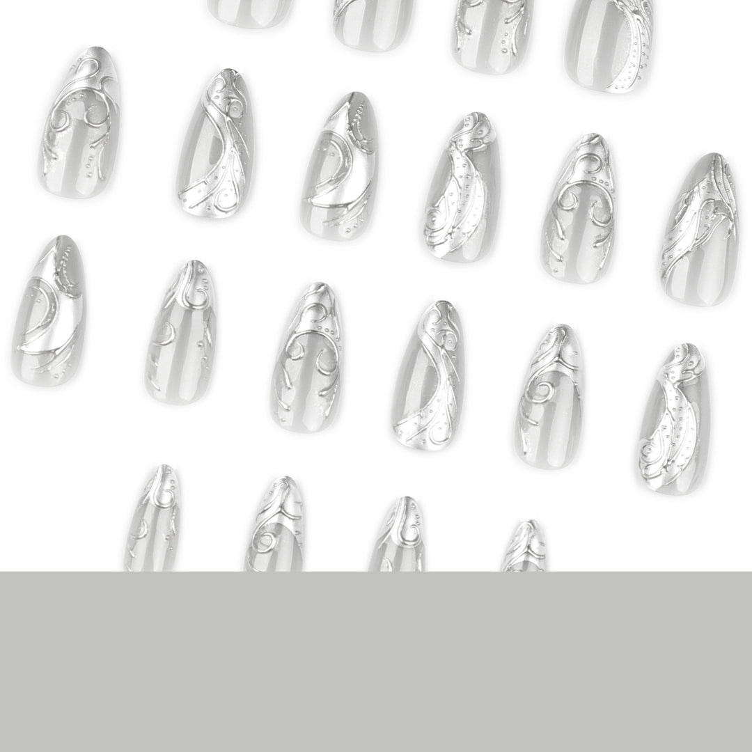 Artistic stiletto nails with elegant silver design Kalsten