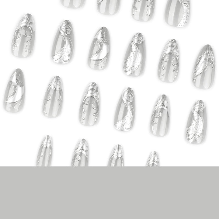 Artistic stiletto nails with elegant silver design Kalsten