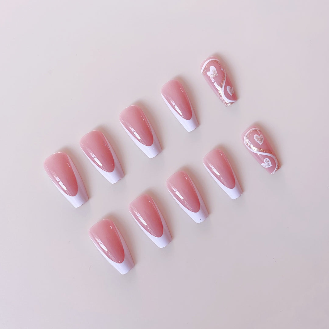 Artificial nail set with elegant heart decorations and glitter accents Kalsten