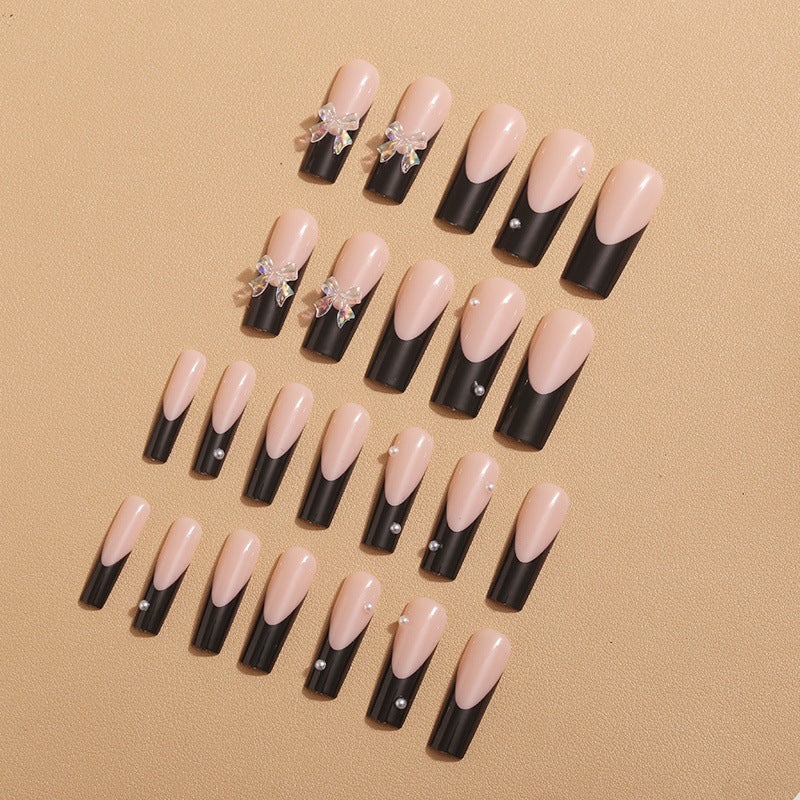 Nail decoration with elegant bows and rhinestones Kalsten