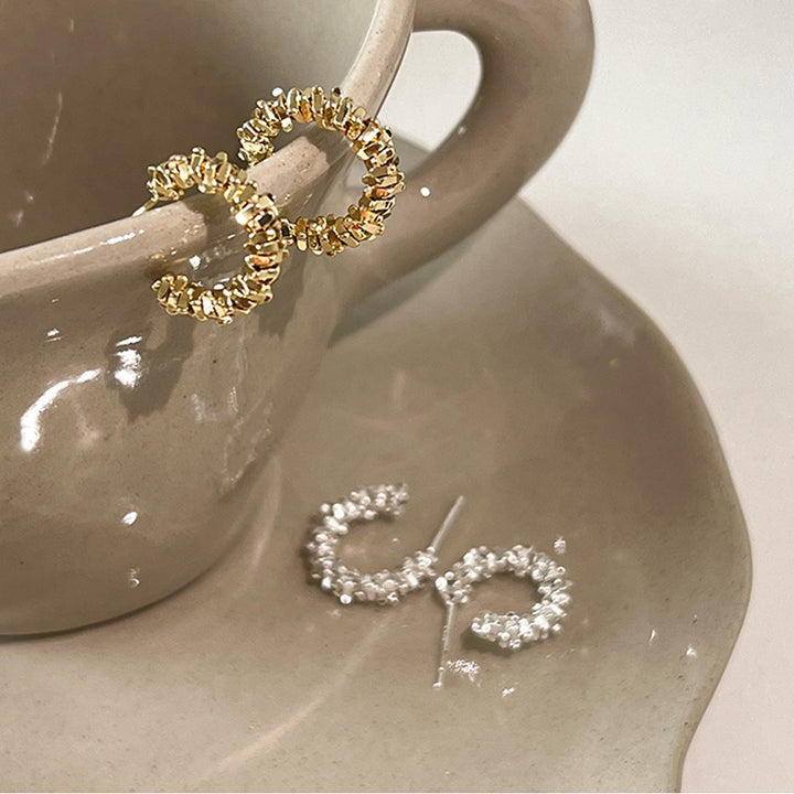 Sparkling hoops with sparkling details Kalsten
