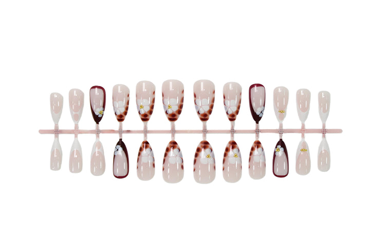 Art nail set with elegant flower and ombré designs Kalsten