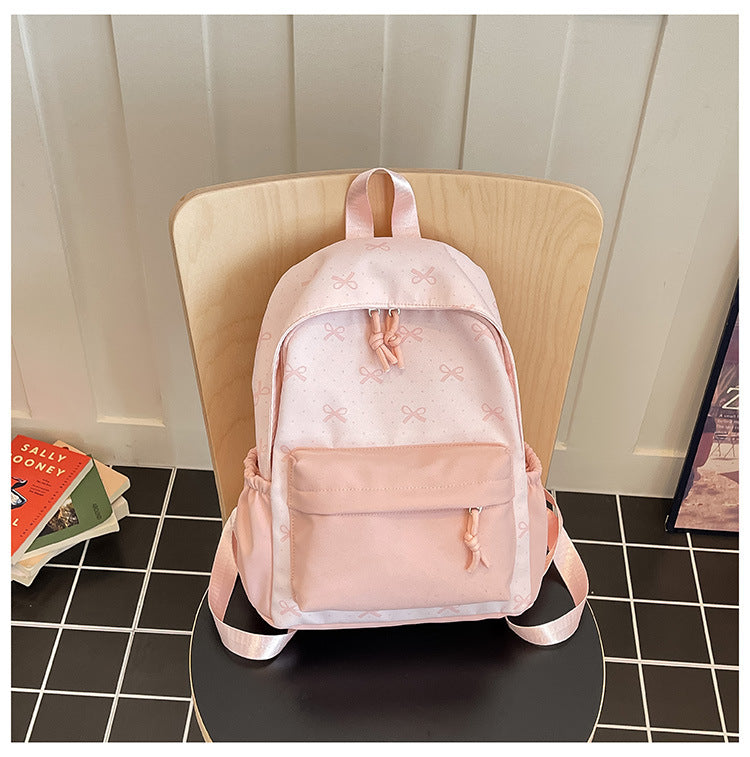 Cute everyday backpack with embroidered bows Kalsten