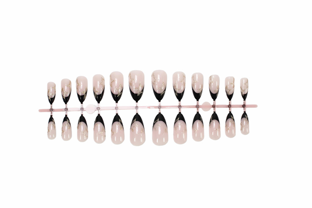 Acrylic nail set with elegant French tip design and glamorous accents Kalsten