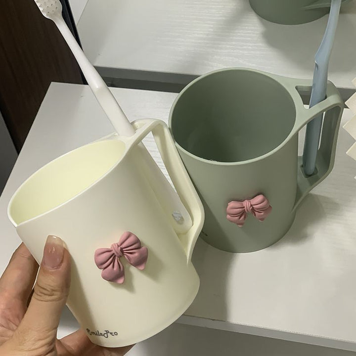 Ceramic mug with elegant bow motif Kalsten
