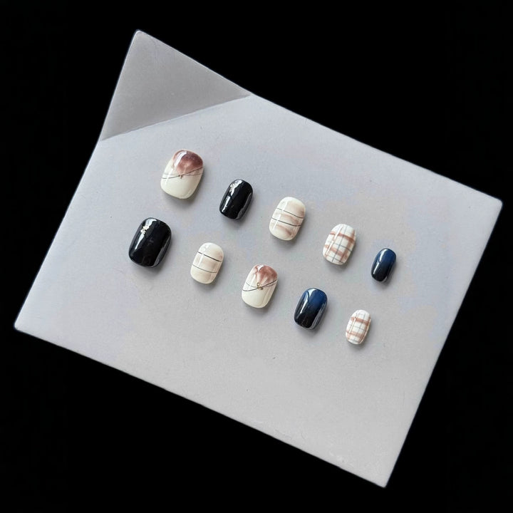 Artistic Press-On Nail Set with Abstract Marble Design
