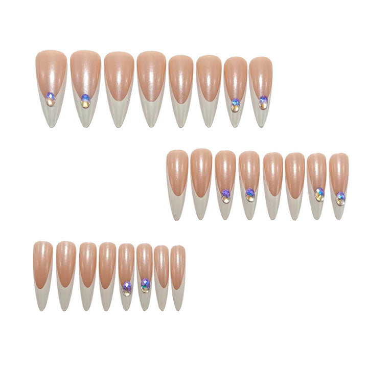 Artificial nails in modern stiletto design with glitter accents Kalsten
