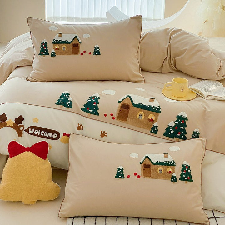 Cozy bedding set with embroidered winter house and Christmas tree motifs