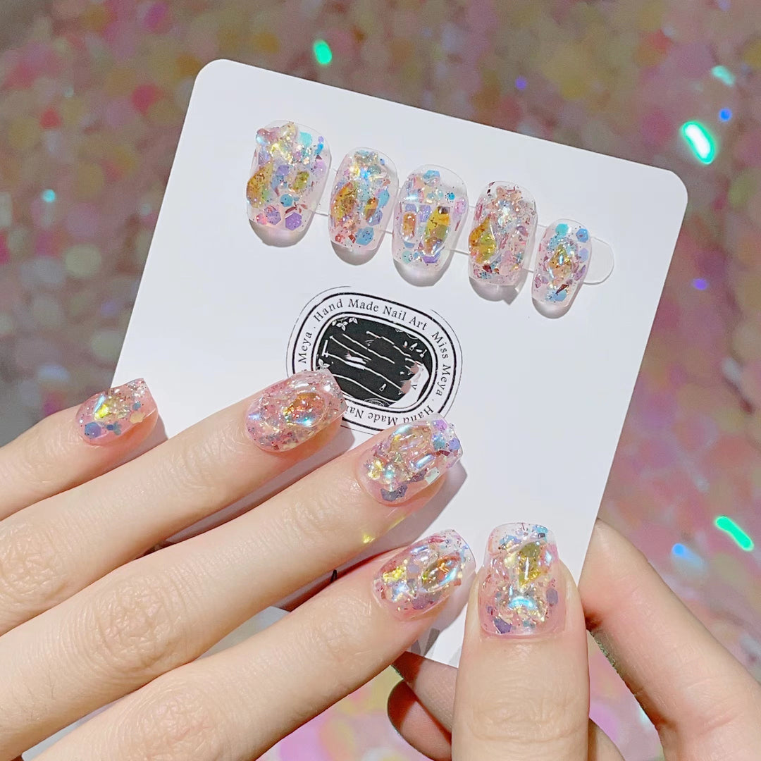 Artful nail tips with glitter accents Kalsten