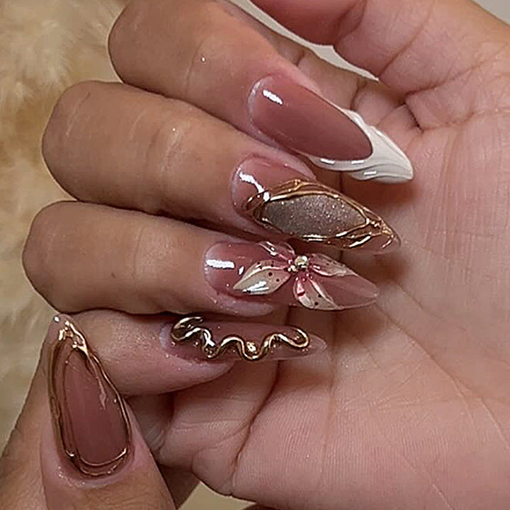 Artificial nail set with elegant blooming designs and golden accents Kalsten